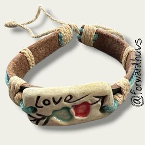 Adjustable Leather Bracelet – Ceramic “Love” Centerpiece